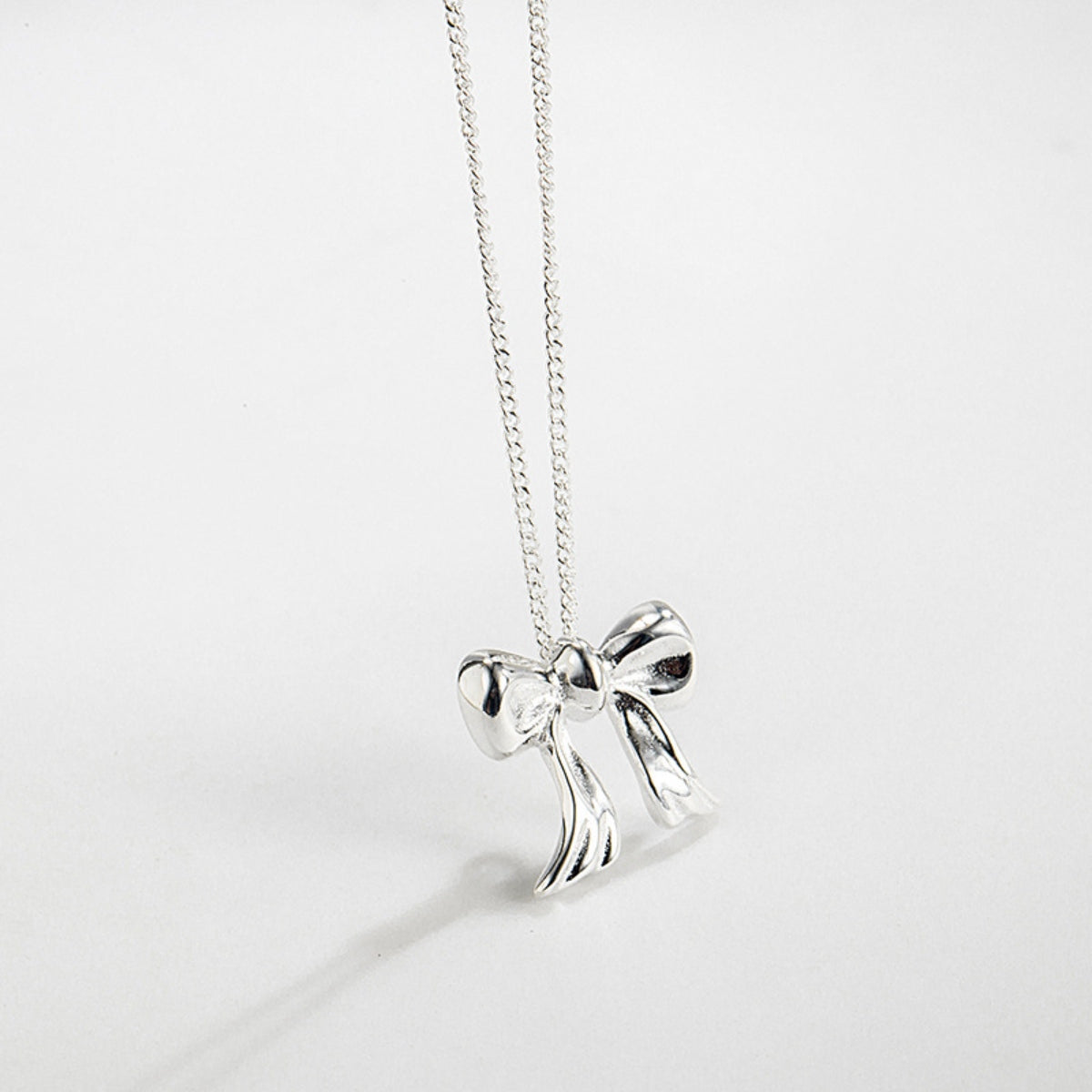 Copper Bow Shape Pendant Necklace Silver One Size